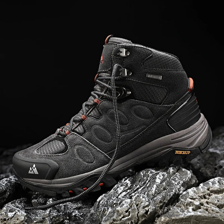 TrailMaster Pro Trek Boots on rocky terrain, showcasing waterproof design and durable materials for outdoor adventures.